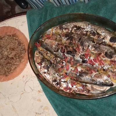  صينيه سمك بورى بالبطاطس ورز بالبصله 