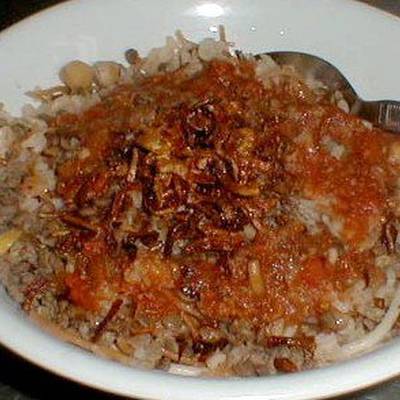  طريقة عمل كشري بصلصة الطماطم 