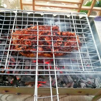  بط مشوي على الفحم 