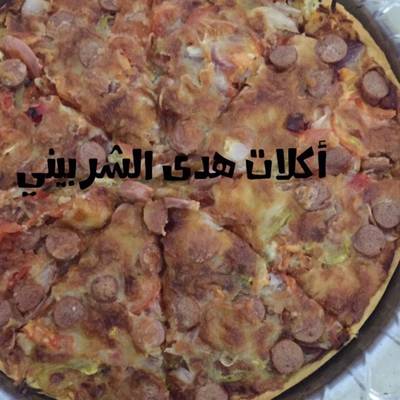  بيتزا بالعجينه الرقيقه 