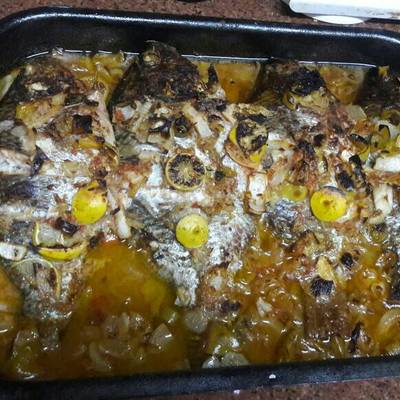  صينية بلطي بالزيت والليمون